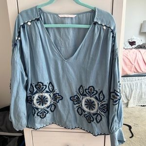 Blue flowy blouse